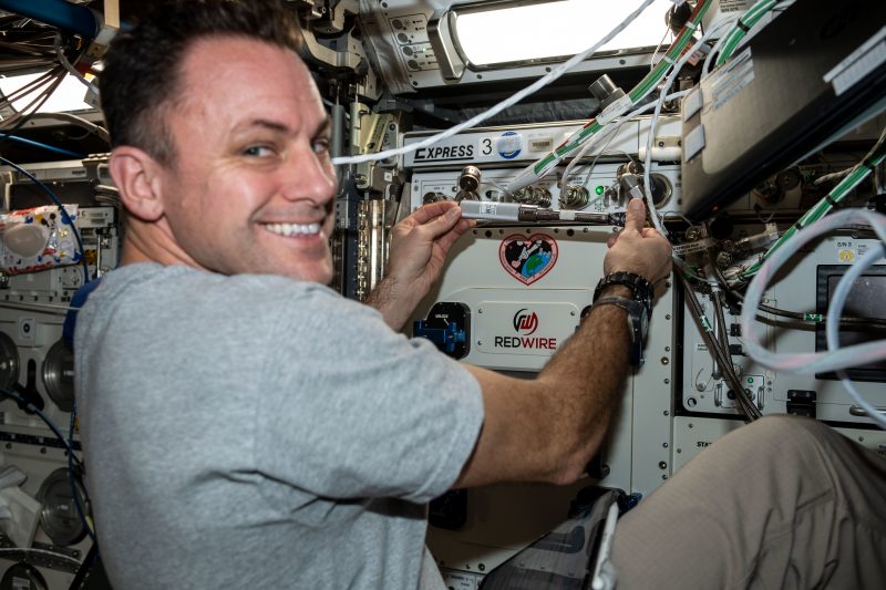 Caption: NASA astronaut Josh Cassada installs Redwire's 3D BioFabrication Facility on the ISS. (Credit: NASA)